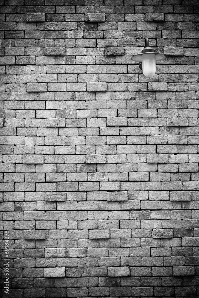 Old brick wall with lamp