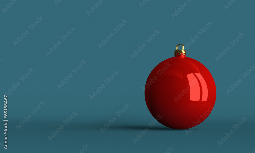 Red Christmas ball on bluish background Red Christmas ball on bluish background
