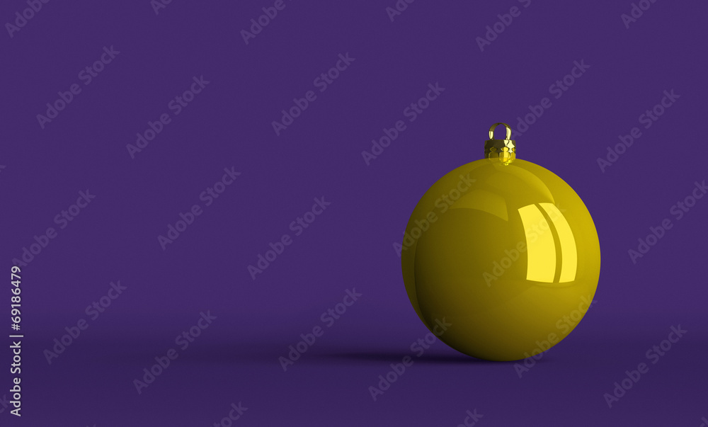 Yellow Christmas ball on violet background