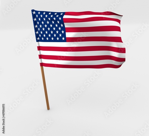 waving united states of america flag on the flag pole