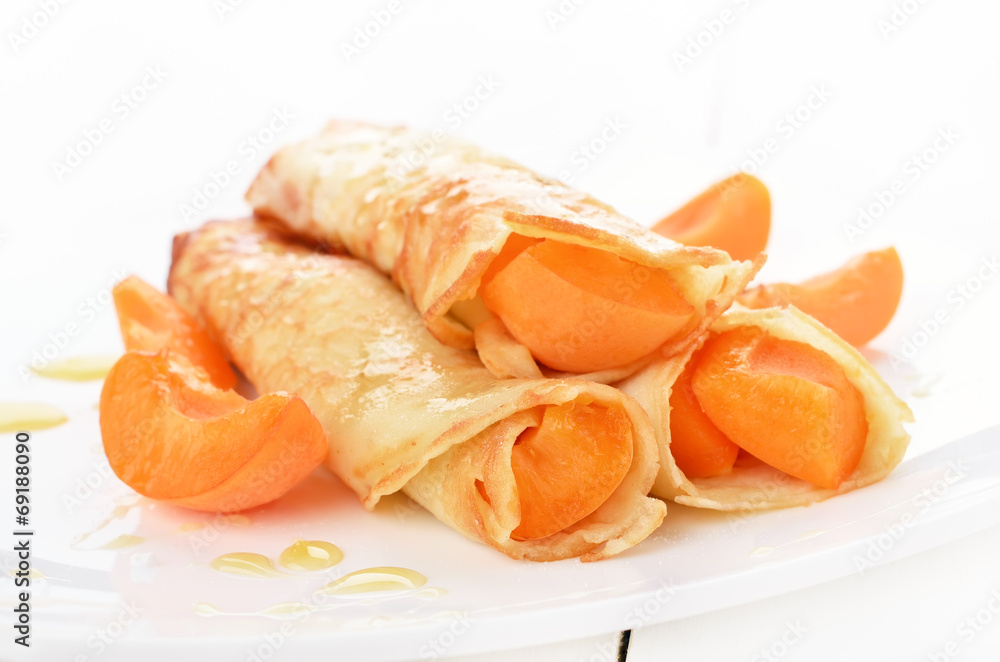 Crepes with apricot slices