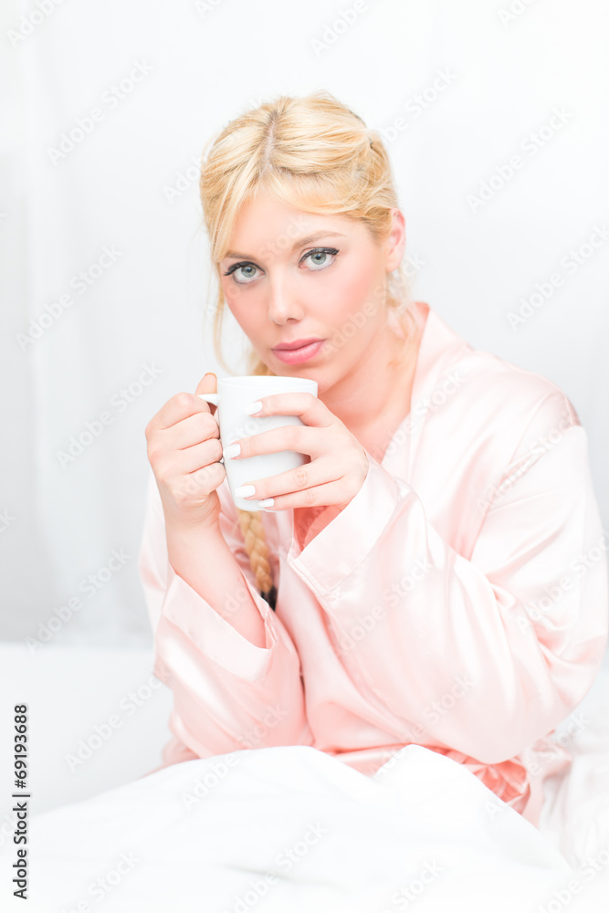 Beautiful blonde woman in the bed Beautiful blonde woman in the bed