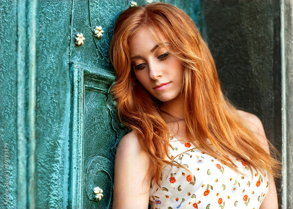 Red-haired girl on the street Red-haired girl on the street