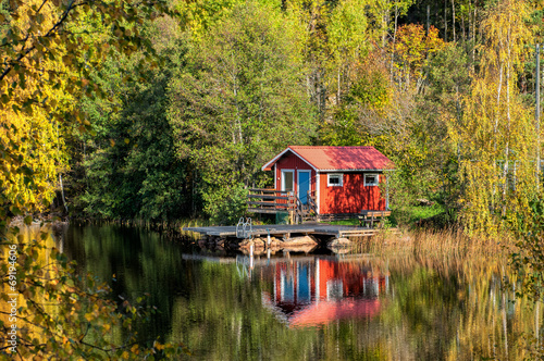Fototapeta Traditional Swedish summer cottage during autumn