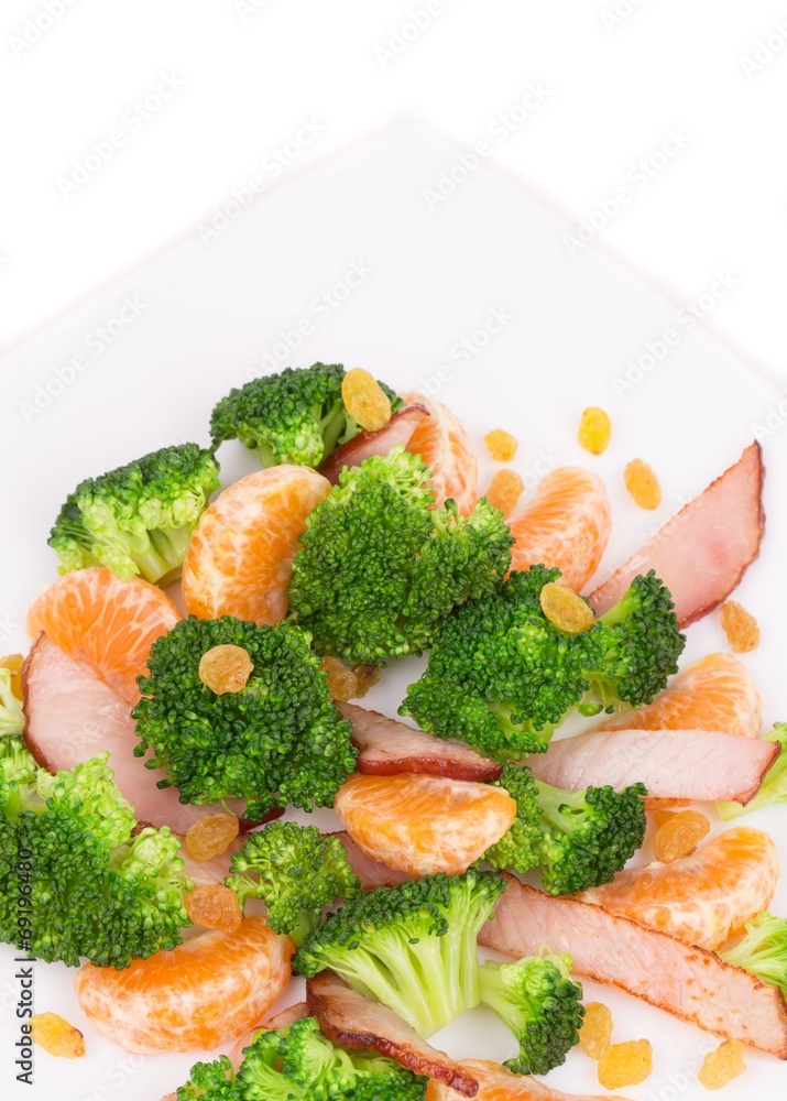 Broccoli salad with raisins and orange. Broccoli salad with raisins and orange.