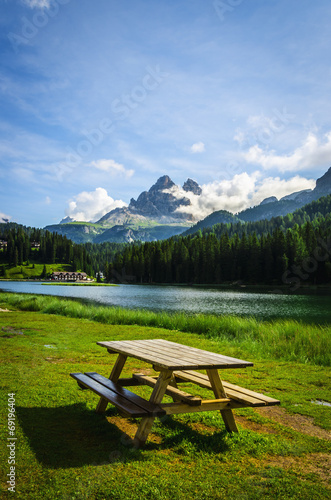 Picnic tables & beautiful alpine lake Misurina, Dolomites, Italy
