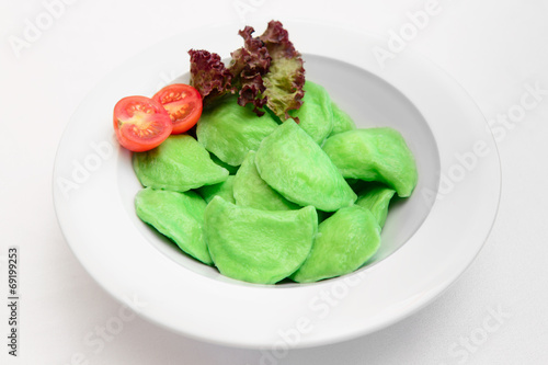 green dumplings on a plate