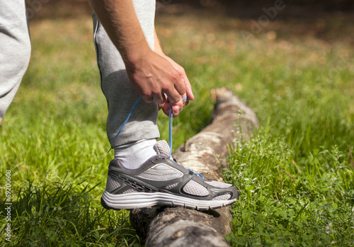 Sports shoes and athlete © Savvapanf Photo ©