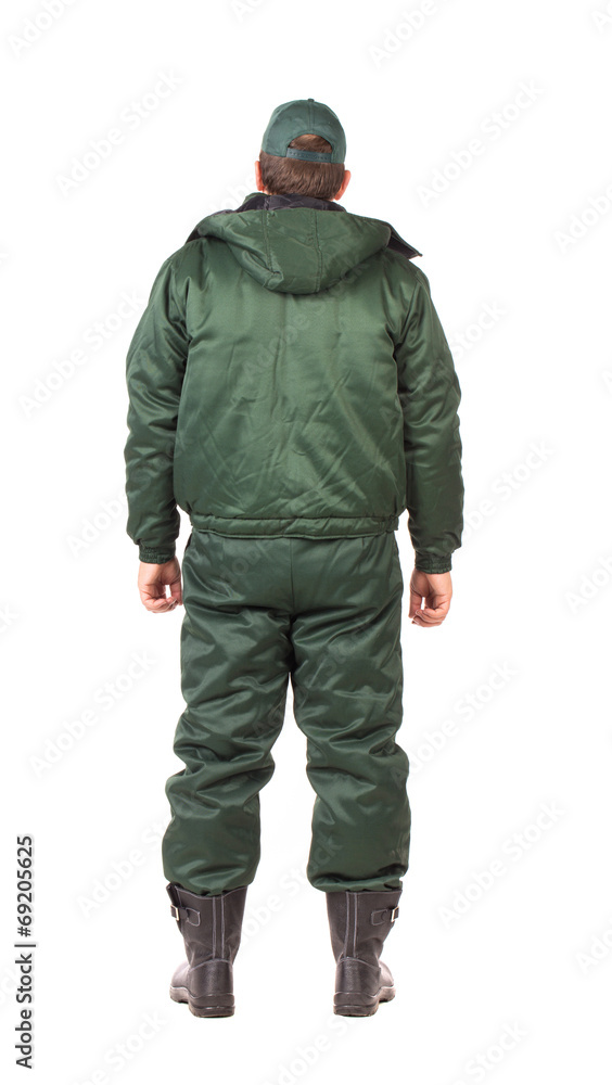 Worker in winter vest. Back view. Worker in winter vest. Back view.