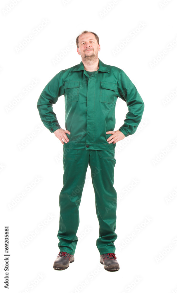 Worker in green workwear. Worker in green workwear.