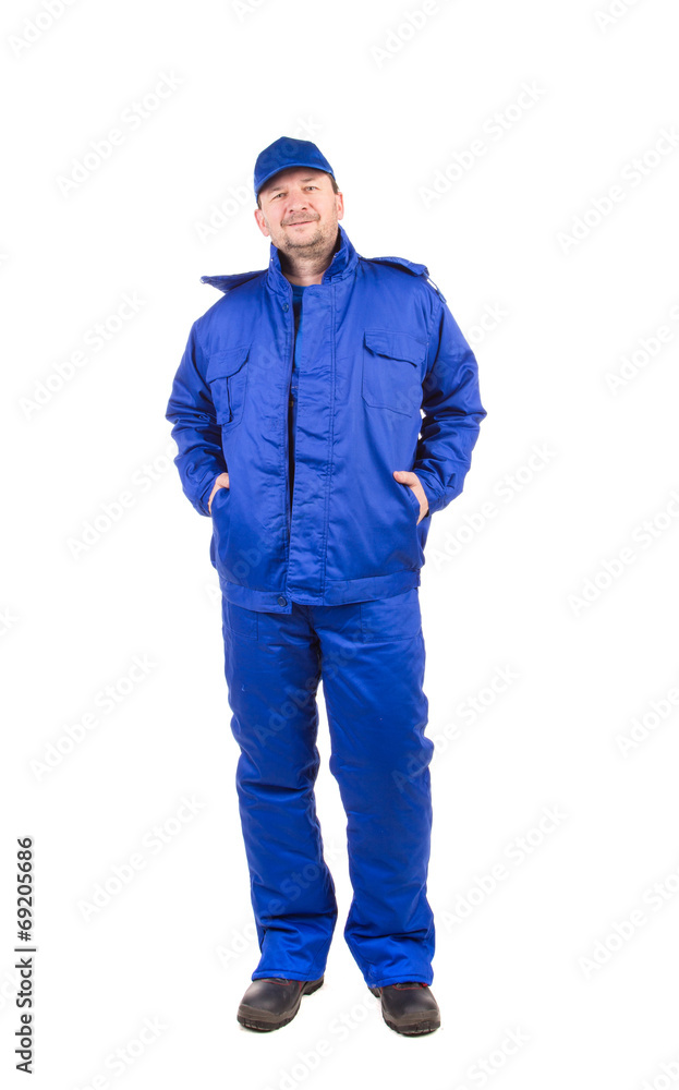 Worker in blue workwear. Worker in blue workwear.