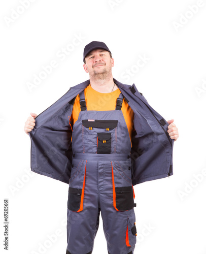 Worker wearing overalls.