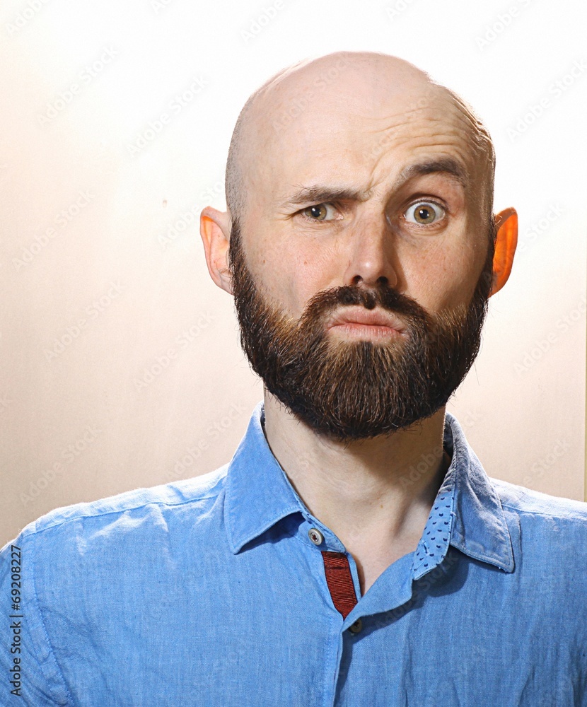 Fototapeta premium bearded man in a blue shirt