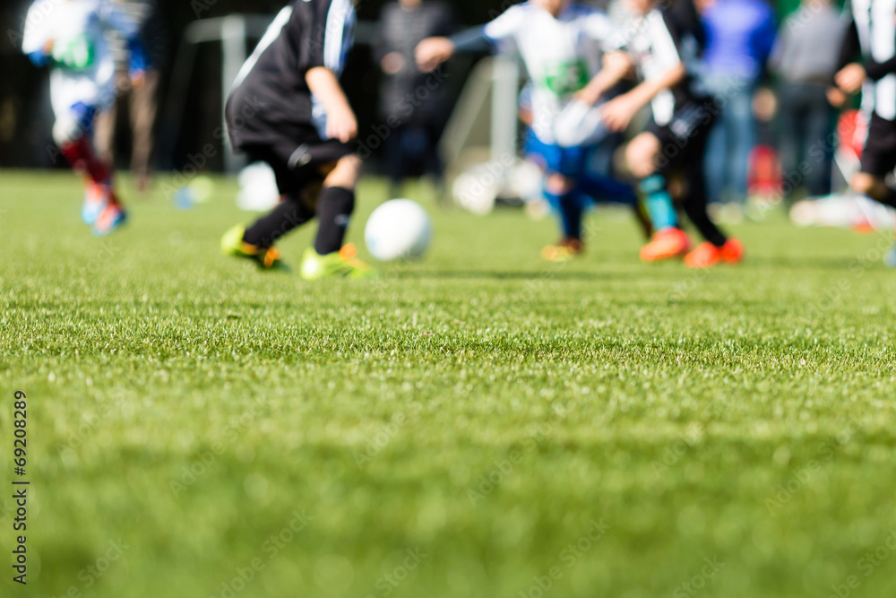 Fototapeta premium Kids soccer blur