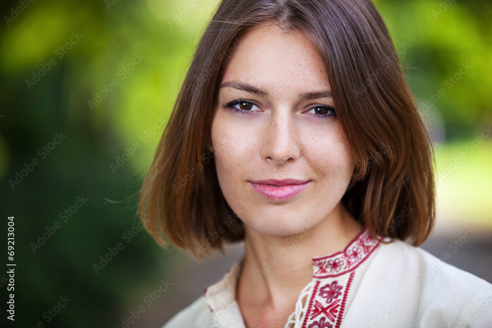 Closeup of young beautiful woman in summer park Closeup of young beautiful woman in summer park