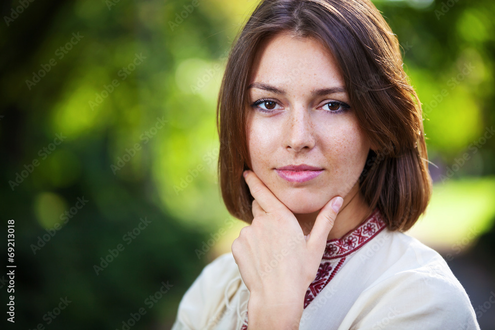 Closeup of young beautiful woman in summer park Closeup of young beautiful woman in summer park