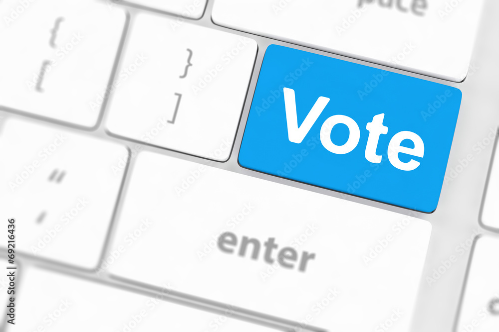 vote button on computer keyboard showing internet concept vote button on computer keyboard showing internet concept