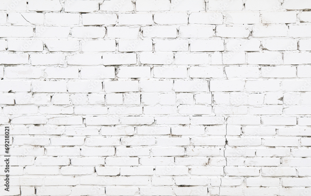 Obraz premium Old brick wall with white bricks