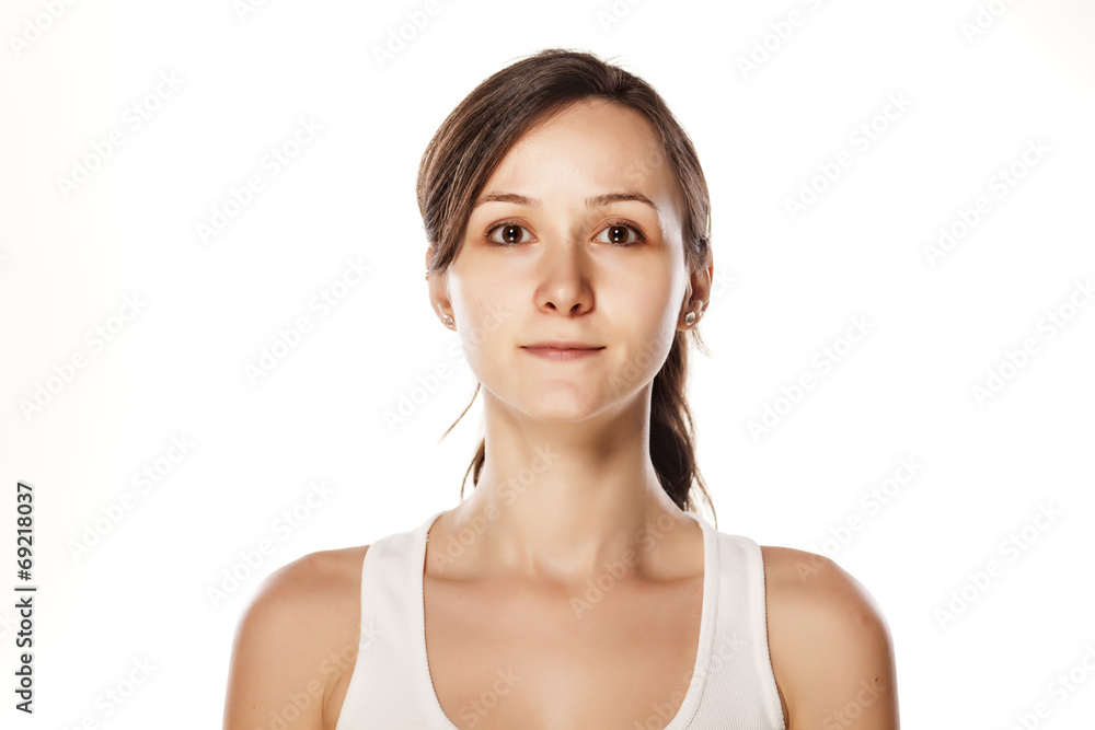 portrait of a serious young woman without make-up portrait of a serious young woman without make-up