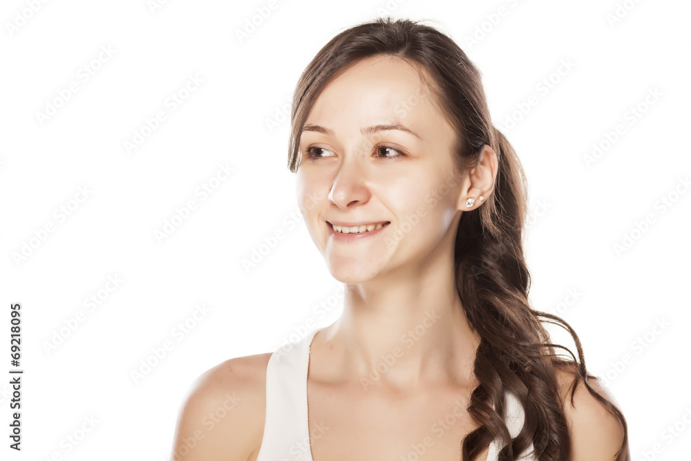 Smiling portrait of a young woman without make-up Smiling portrait of a young woman without make-up