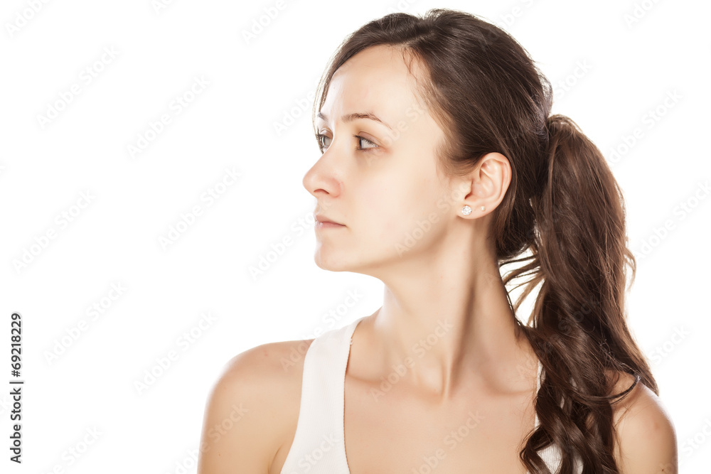 profiile of serious young woman without make-up profiile of serious young woman without make-up