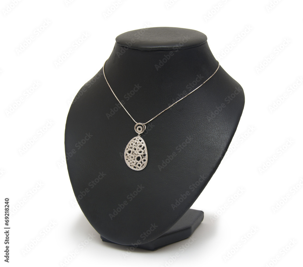 Diamond necklace on black mannequin isolated on white background Diamond necklace on black mannequin isolated on white background