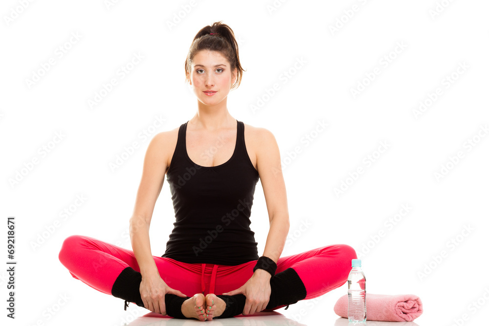 Flexible girl doing stretching pilates exercise Flexible girl doing stretching pilates exercise