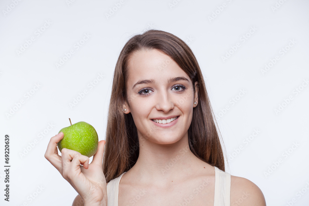 Healthy lifestyle. Beautiful girl holding apple. Healthy lifestyle. Beautiful girl holding apple.