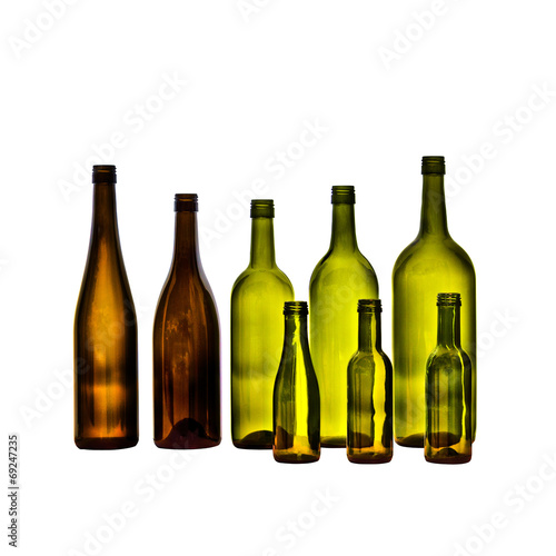 Empty glass wine bottles on white background