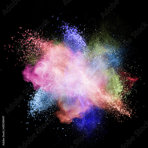 Color powder explosion isolated on black
