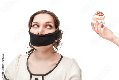 Gagged plus size woman seduced with pastry photo