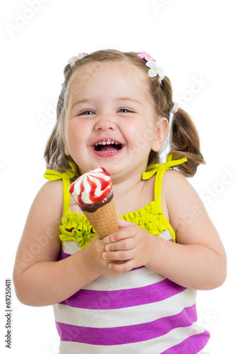 joyful child girl eating ic...