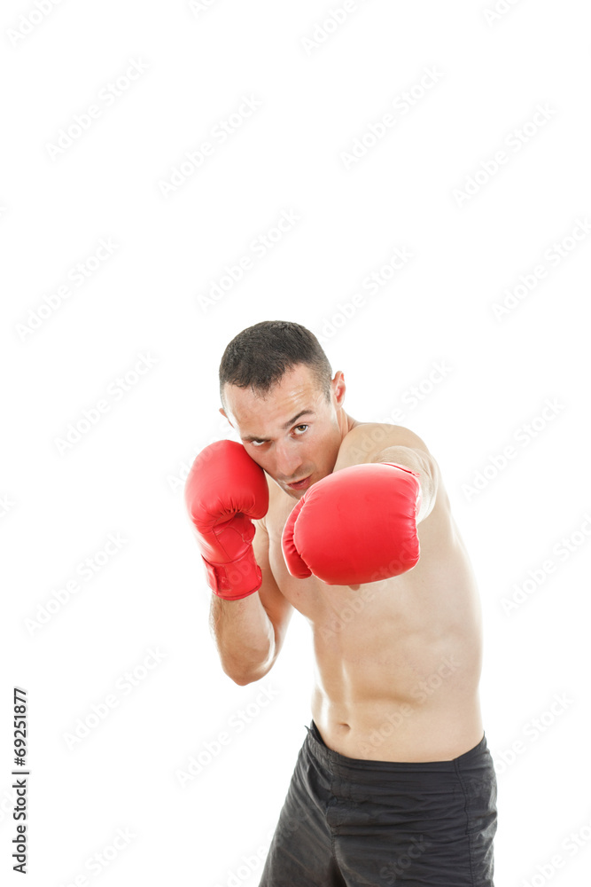 Man punching with red boxing gloves isolated on white background Man punching with red boxing gloves isolated on white background