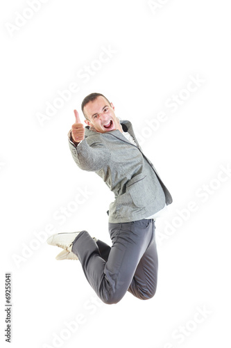 Man in suit laughing and jumping up with thumb up © feelphotoartzm