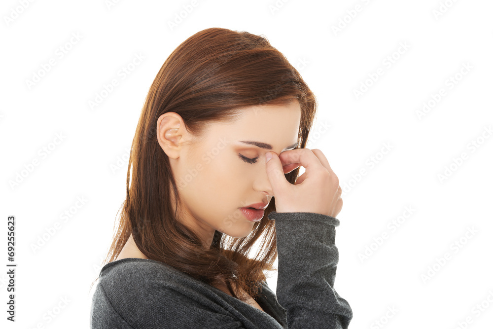 Woman with sinus pressure pain Woman with sinus pressure pain