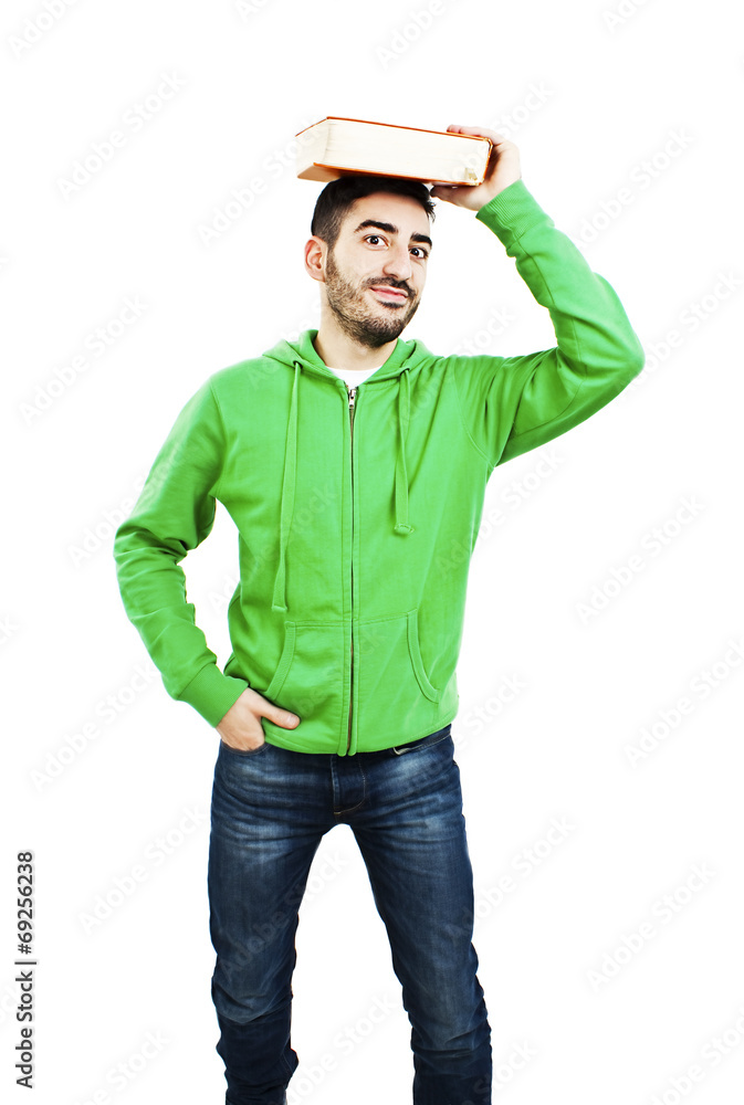 Portrait of student with book on the head on white background Portrait of student with book on the head on white background