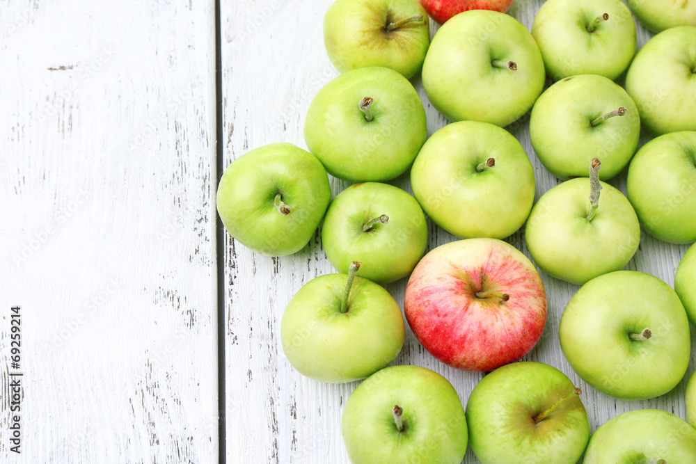 Ripe apples on wooden table close-up Ripe apples on wooden table close-up