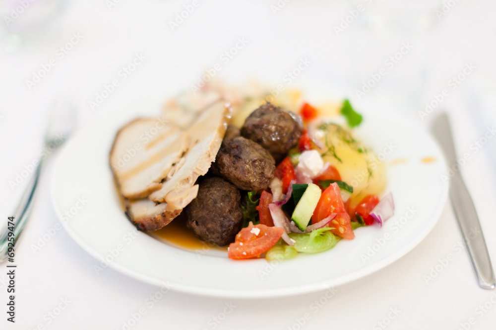 Food on a white plate in a white background Food on a white plate in a white background