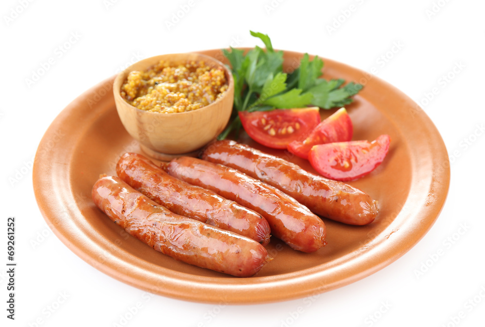 Tasty thin sausages on plate isolated on white