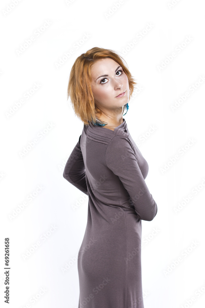 beautiful red-haired young woman in a long evening dress beautiful red-haired young woman in a long evening dress