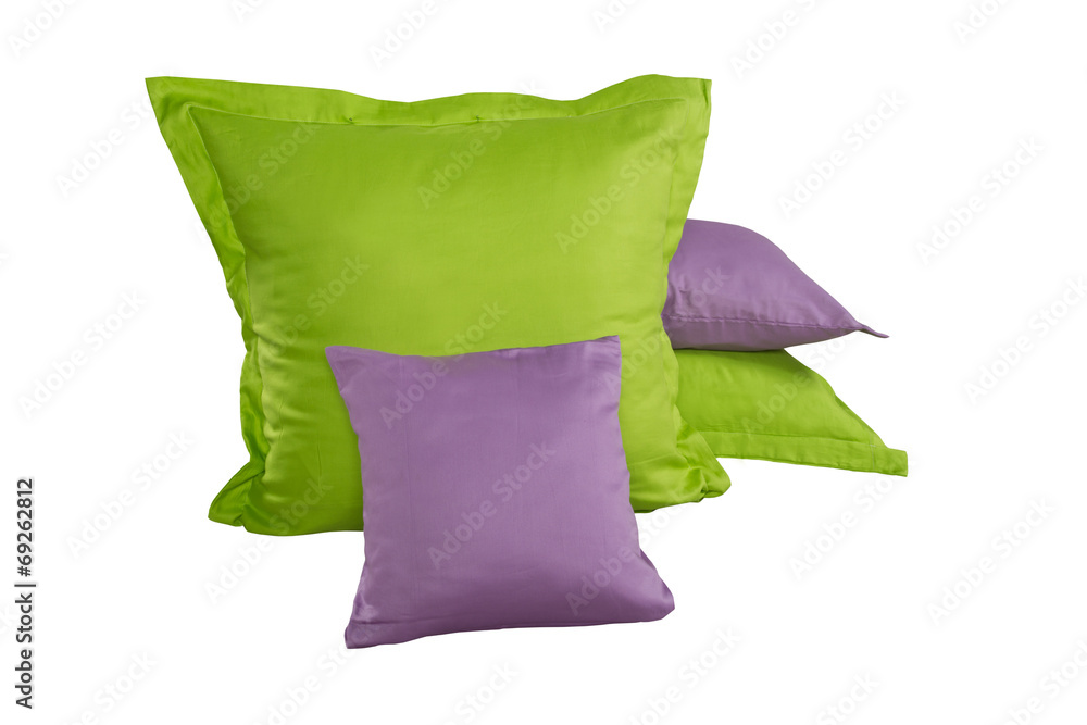 pile of green and violet pillows isolated on white background