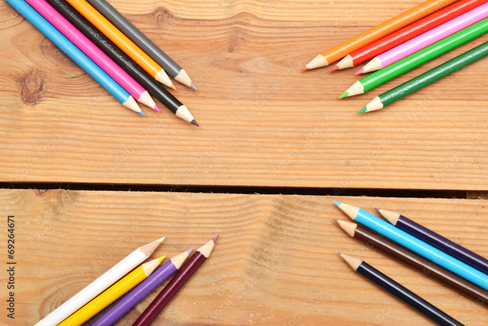 Obraz premium Colored pencils on wood