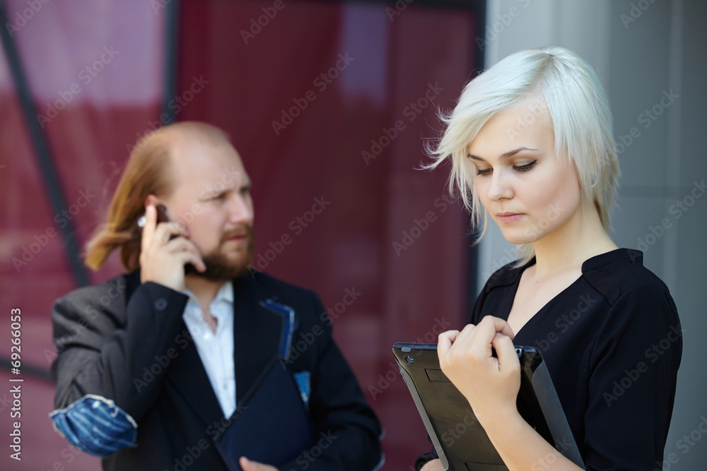 businessman and business woman are discussing businessman and business woman are discussing