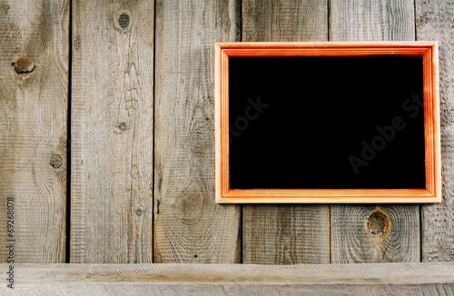 Frame and a wooden shelf.