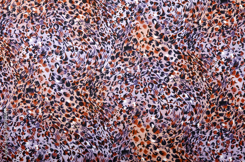 Purple and brown leopard pattern.Animal print as background.