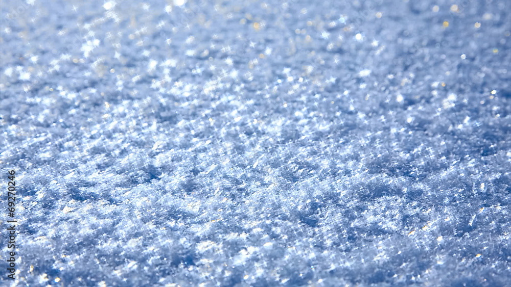 Blue snow with sparkles. Close up view with shallow focus Blue snow with sparkles. Close up view with shallow focus