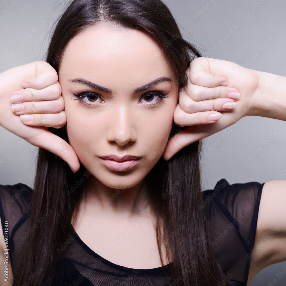 Fototapeta premium Portrait of attractive young woman