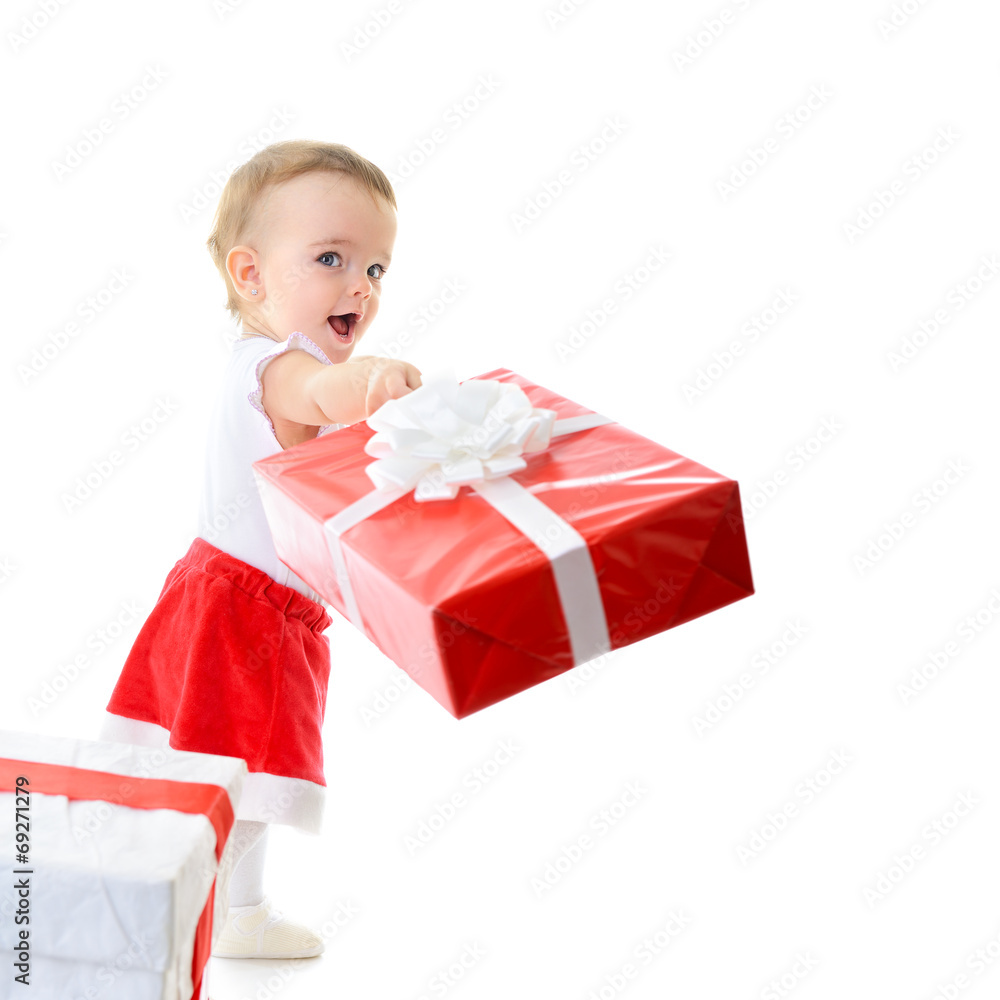 Holidays, baby girl make a present, christmas, birthday, new yea Holidays, baby girl make a present, christmas, birthday, new yea