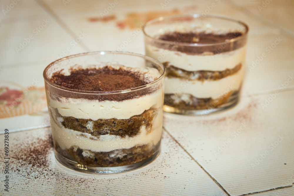 Traditional italian dessert tiramisu in a glass Traditional italian dessert tiramisu in a glass