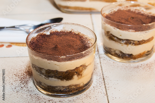 Traditional italian dessert tiramisu in a glass